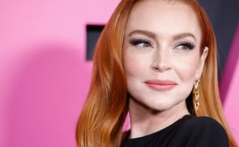 Lindsay Lohan Wows Fans as She Flaunts Her Figure in a Body-Hugging Black Dress at Paris Fashion Week 2024